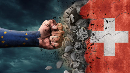 Wall Mural - Fist breaking rock. EU destroying Switzerland