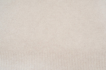 Close up of cashmere Texture - Text space - slow fashion concept - natural fabric - greige finish