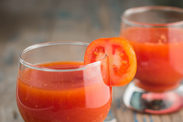 two glasses of freshly squeezed tomato juice