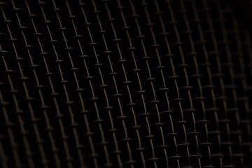 Wall Mural - closeup macro of microphone dark black texture