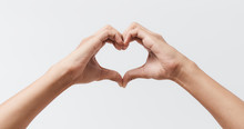Man Hands Making A Heart Shape On A White Isolated Background