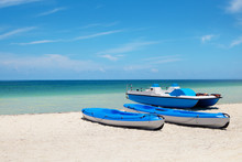 Blue Kayaks On The Beach Of Cayo Blanco Island In Caribbean Sea