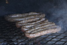 South African Boerewors (traditional Sausage) Being Grilled On A Braai (Barbeque). 