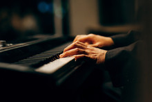 Hands Of Pianist Playing Synthesizer Close-up