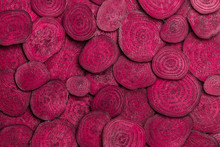 Background Of Heap Fresh Colorful Beetroot Slices