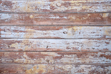 Wall Mural - Background. An old wall of wooden wagon with peeling paint.