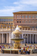 Rome, Italy - Panoramic view of the St. Peter’s Square - Piazza San Pietro - in Vatican City State, with the granite fountain and the colonnade