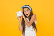 © be free - Guess what inside box. Accessories and cosmetics. Summer season. Buy gift. Online shopping. Perfect gift concept. Cute small kid adorable dress. Girl long hair hold gift box. Present for teen girl