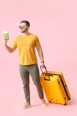 Sticker - Handsome male tourist on color background