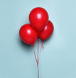 Bunch of red balloons object for birthday party celebration or valentines day present on pastel color light blue