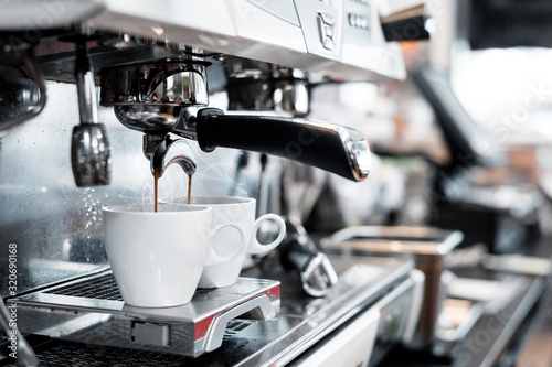 Fotomural two black coffee morning on coffee maker
