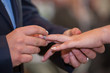 © Bjorn B - An unrecognizable bride and groom exchanging of the Wedding Rings in church during the christian wedding ceremony