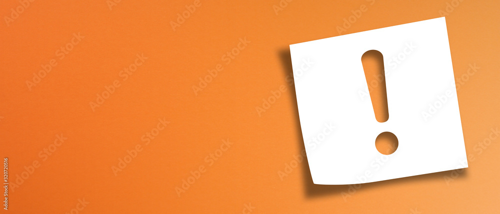 Note paper with exclamation mark on panoramic orange background - obrazy, fototapety, plakaty 