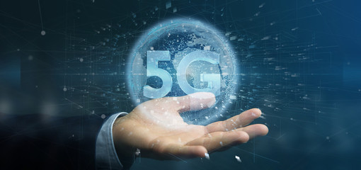 Poster - Businessman holding a 5G connection with data surrounding - 3d rendering