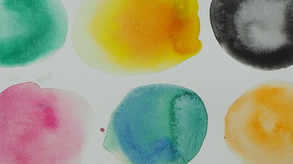 Watercolor hand painted circle shape design elements. Set of multicolored watercolor dots