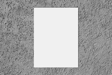 Wall Mural - White blank sheet on light gray Textured cement or concrete wall background.