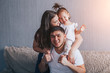 © Anastassiya  - happy family mother, father, child daughter at home
