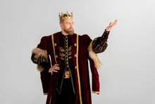 King With Crown Pointing With Hand Isolated On Grey