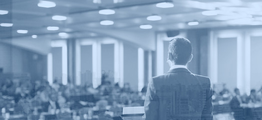 Fototapete - Conference photo audience and speaker giving speech. Seminar presenter at CEO forum. Real estate expert in training lecture. Investor pitch presentation workshop picture.