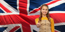 Patriotism, Gesture And People Concept - Smiling Young Teenage Girl Showing Thumbs Up Over British Flag Background
