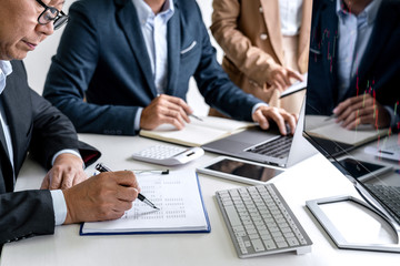 Poster - Business team partner working with computer, laptop, discussion and analyzing graph stock market trading with stock chart data planning, financial and investment concept