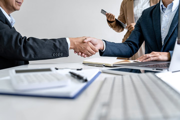 Aufkleber - Teamwork partnership meeting concept, Two confident Business shaking hands after discussing good deal of trading contract and new projects for both companies