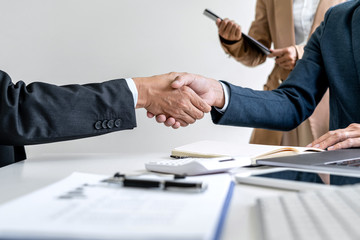 Aufkleber - Teamwork partnership meeting concept, Two confident Business shaking hands after discussing good deal of trading contract and new projects for both companies