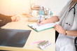 © Stock_ko - The doctor explained about the patient's disease. The patient consulted a doctor about her disease.