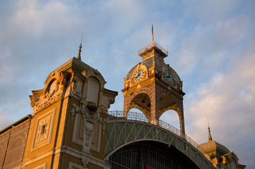 Industrial Palace ( Prumyslovy palac ), Prague - Holesovice, Czech Republic / Czechia - historical building made in art nouveau style. Bottom view of beautiful architecture. Lit by golden hour light.