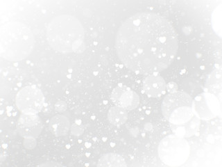 Wall Mural - white heart bokeh glittering abstract background.