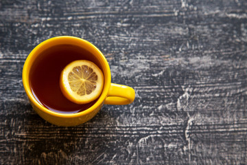 cup of black tea with lemon