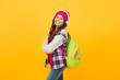 © be free - Ready to study. happy holiday time. child casual style. modern online education. childhood happiness. small girl headphones with backpack. back to school. ebook concept. small schoolgirl listen music