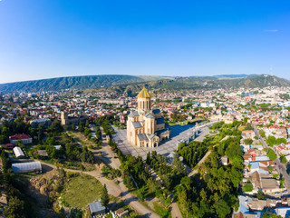 Canvas Print - Panorama of the Tbilisi and Holy Trinity Cathedral of Tbilisi commonly known as Sameba, the biggest cathedral of Georgian Orthodox Church located in Tbilisi, the capital of Georgia.