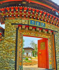 Sticker - The Bhutanese shrine through the gate, Bhutan garden, Rajapruek park, Chiang Mai, Thailand