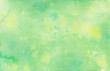 Pastel faded green and yellow hand painted watercolor background design with paint bleed fringing in pretty art design on watercolor paper texture, soft fresh spring color background with no people