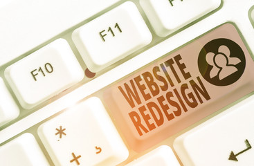 writing note showing website redesign. business concept for modernize improver or evamp your website