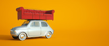 Small Car With Big Sofa On The Roof