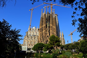 Cathedral of La Sagrada Familia. It is designed by architect Antonio Gaudi and is being built since 1882 with the donations of people