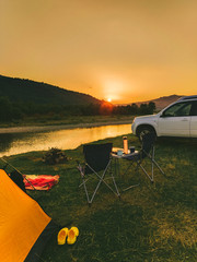 Wall Mural - car travel concept camping place near mountains river