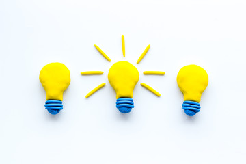 Creativity concept. Bulb icons on white background top-down