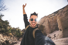 Happy Smiling Man Takes A Selfie At Vacation On A Mountain