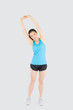 © NT_studio - Beautiful young asian woman in sport standing stretch muscle arm workout with healthy isolated on white background, girl wear shape fit warm up and exercise and yoga for health, wellness concept.