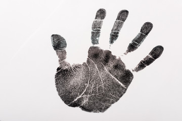 top view of black print of hand isolated on white, human rights concept