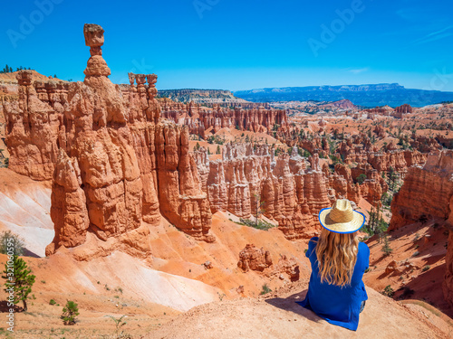 Fotomural Young woman travels Bryce Canyon national park in Utah, United States, people travel explore nature