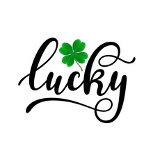 Lucky - Black Handwritten Lettering With Four-leaf Shamrock Isolated On White Background. 17 March St. Patrick's, Valentine's Day Artwork. Good For Greeting Cards, T-shirt, And Mug Design.