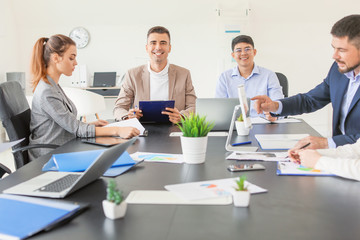 Sticker - Group of business people during meeting in office