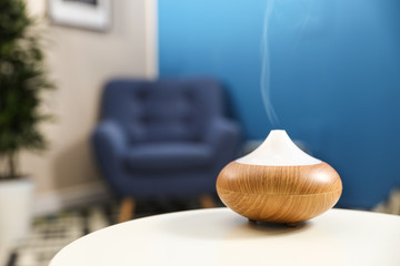 Canvas Print - Aroma oil diffuser on white table at home, space for text. Air freshener