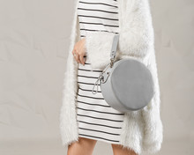 Stylish Fashionable Woman With Grey Round Bag