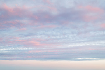 Wall Mural - idyllic vanilla sky of pastel pink and blue colors. evening sky and clouds as tranquil background. s