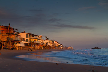 Wall Mural - Oceanfront homes on Malibu Beach at sunset